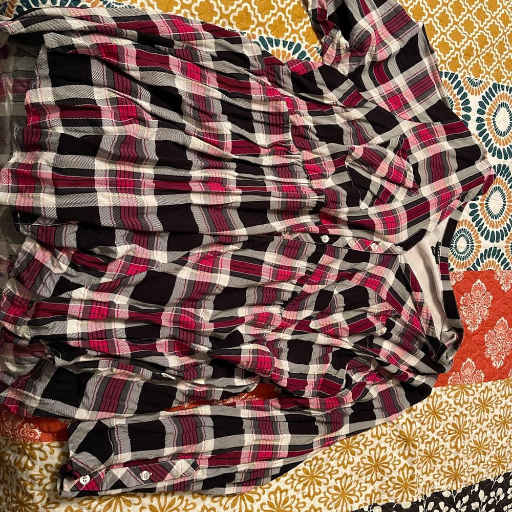 Torrid size 4 top fits like a 3